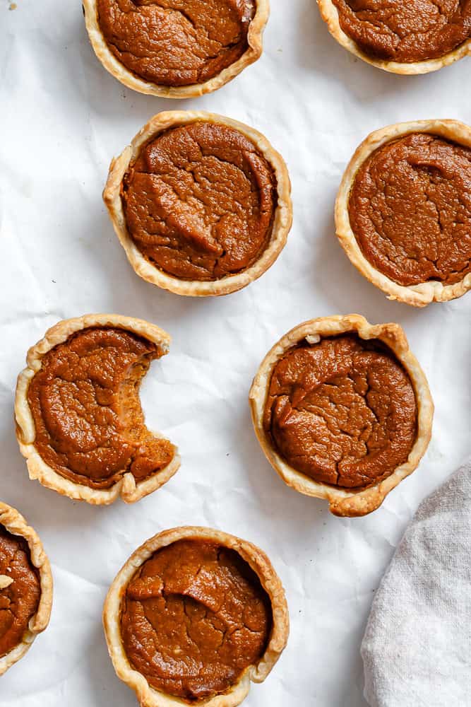 completed Mini Pumpkin Pies on a white surface