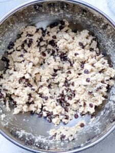 process shot showing cookie dough in bowl
