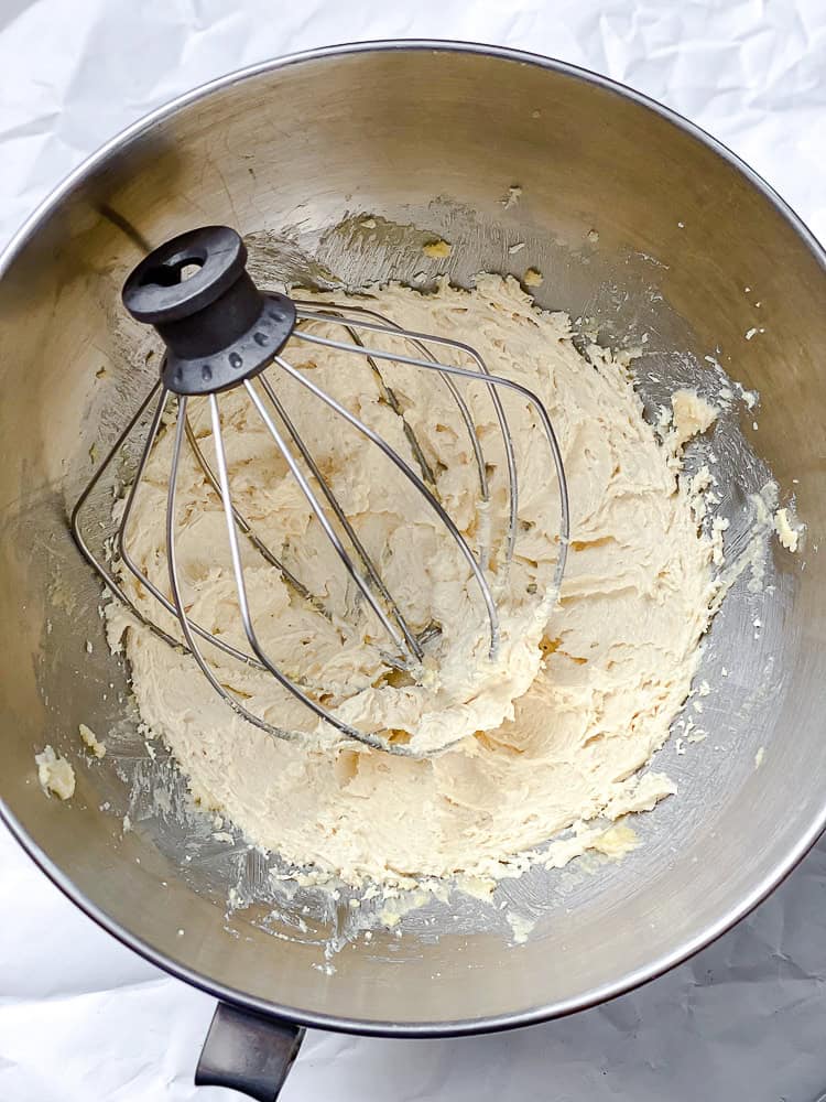 process shot showing mixing ingredients together in bowl