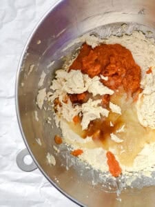 process shot showing mixing ingredients together in bowl