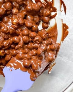 process shot showing vegan chocolate added to chickpeas