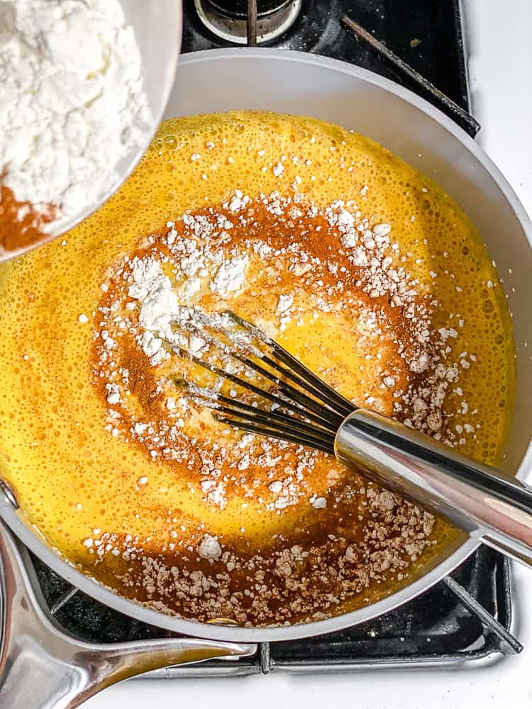 process shot showing mixing ingredients together in pot