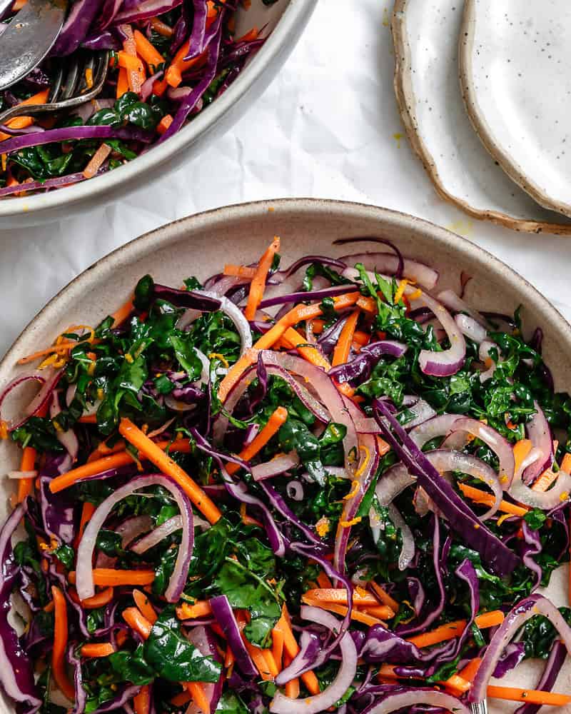 completed Crunchy Kale Slaw on a white surface