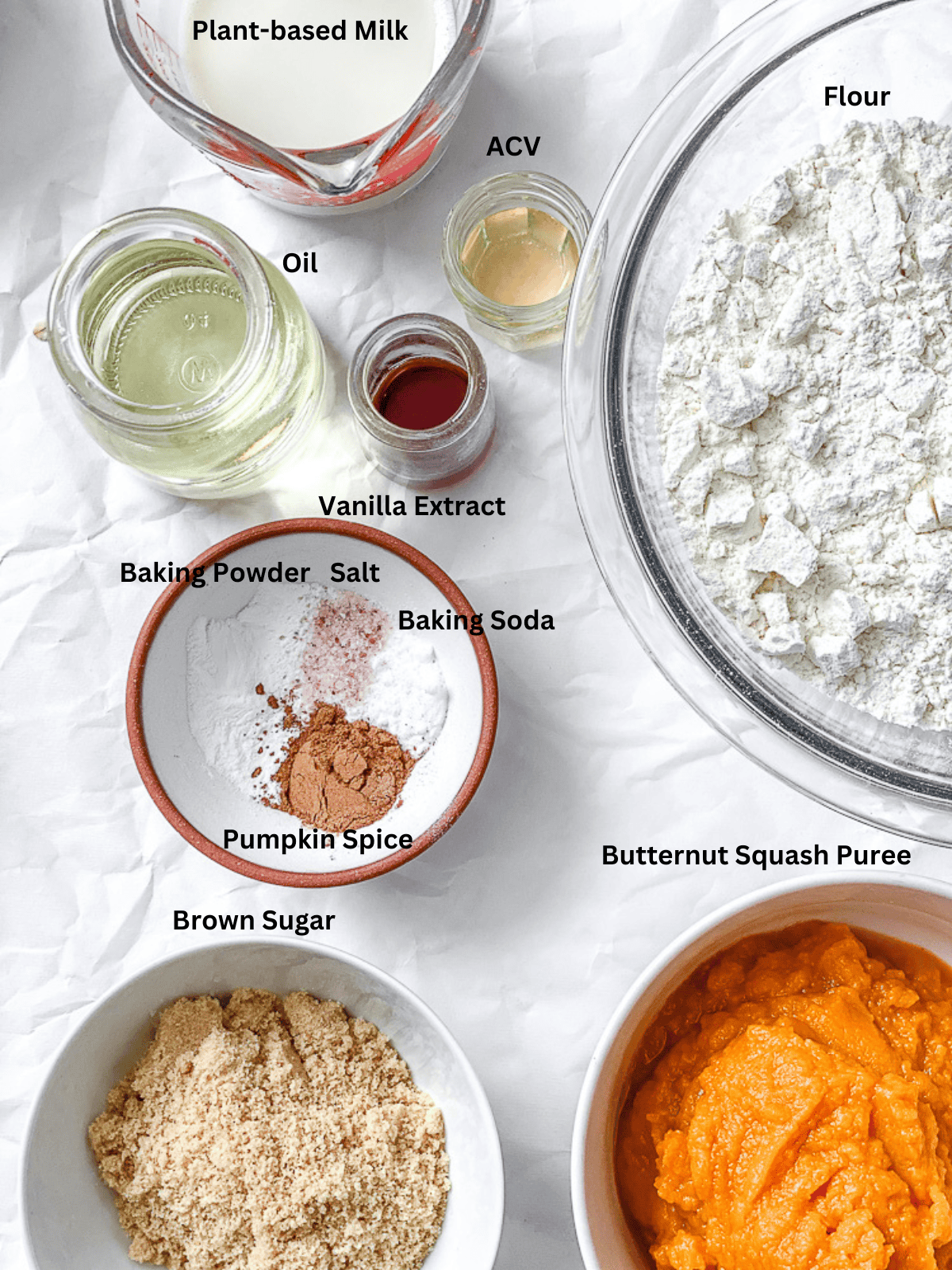 ingredients for Butternut Squash Cake measured out on a white surface