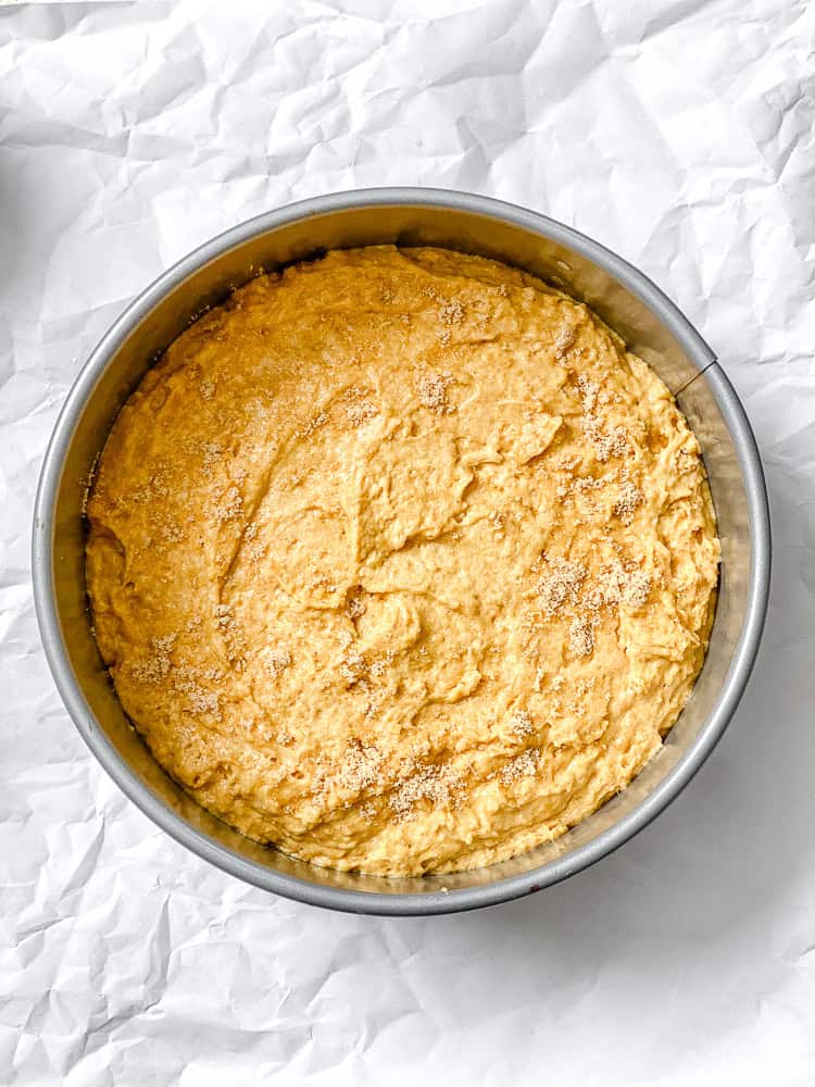 process shot showing batter in cake pan