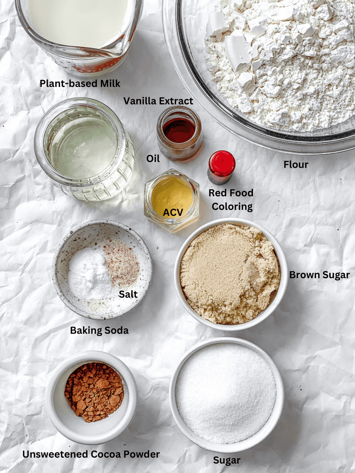 ingredients for Vegan Red Velvet Cake measured out on a white surface