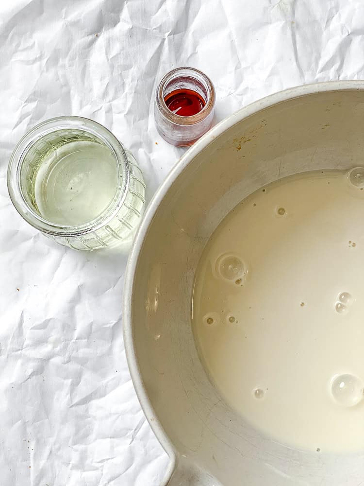 process shot showing ingredients measured out in small bowls and one big bowl