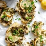 completed Roasted Cauliflower with Lemon and Herbs on a white surface