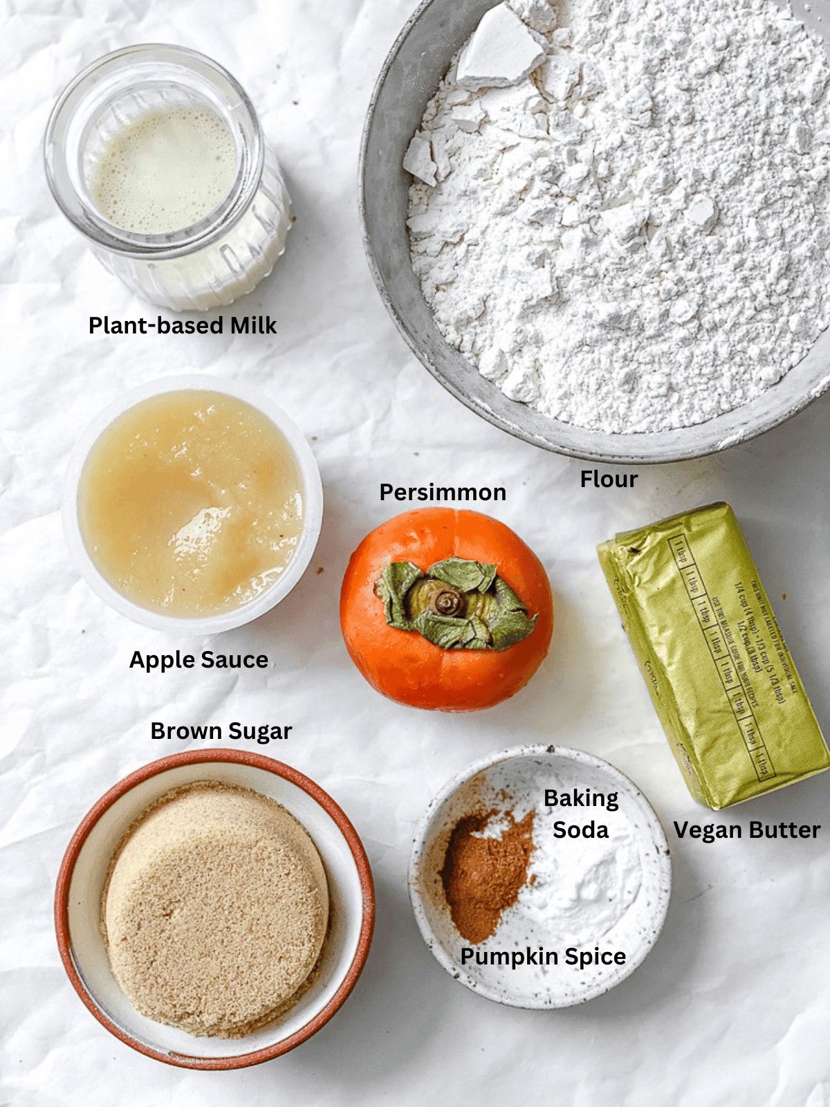 ingredients for Easy Persimmon Cookies measured out on a white surface