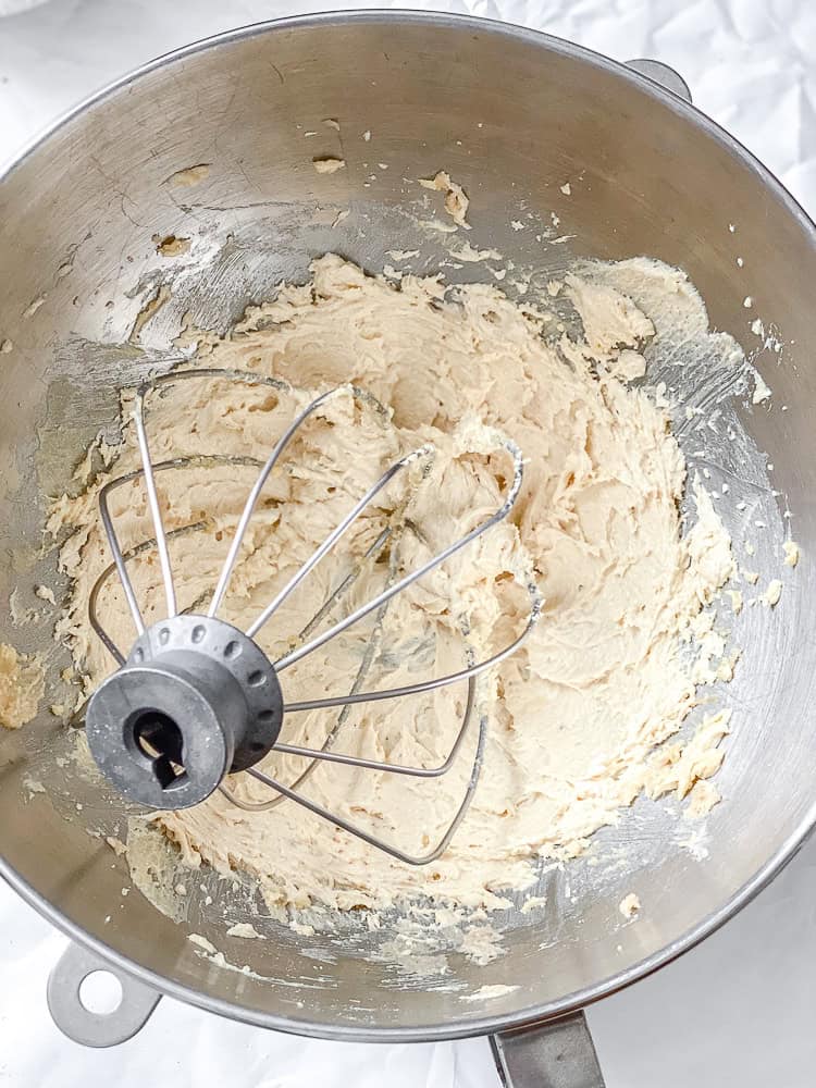 process shot showing mixing ingredients in a bowl