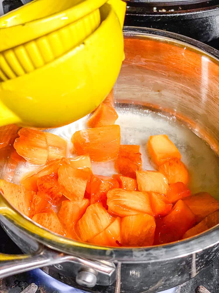 process shot showing adding lemon to pot