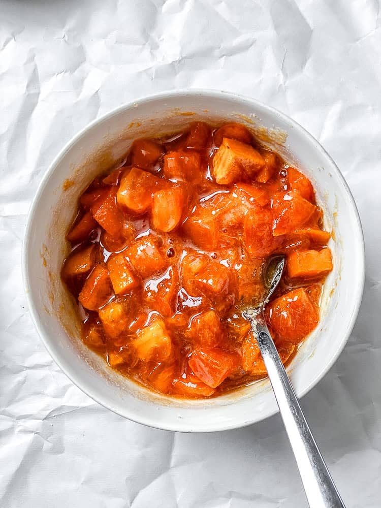 process shot showing mixing persimmons in bowl