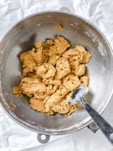 Vegan gingerbread cookie dough being mixed in a bowl