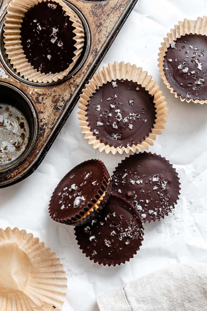Completed Vegan Peanut Butter Cups on a white surface.