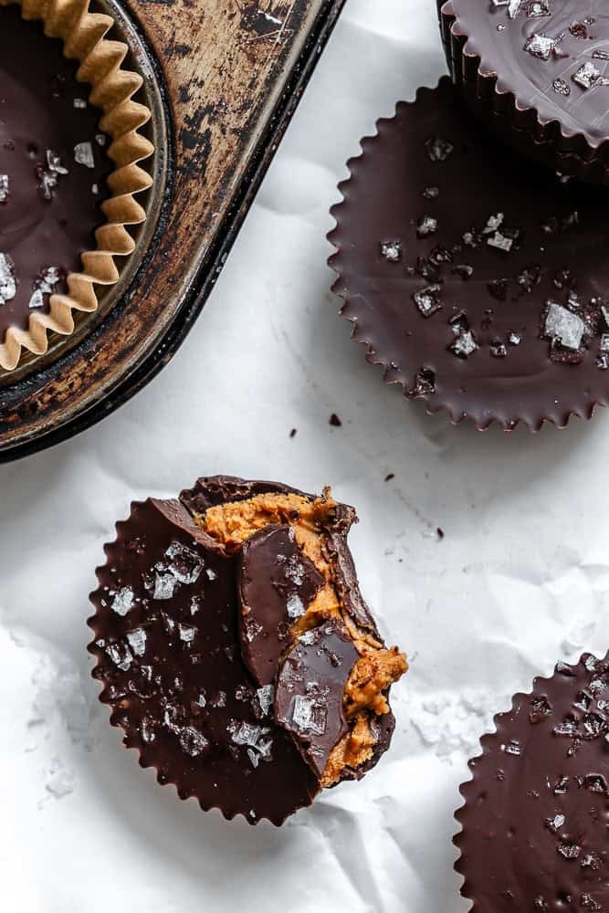 Completed Vegan Peanut Butter Cups on a white surface.