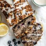 completed Vegan Lemon Blueberry Loaf on a white surface