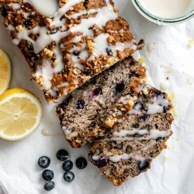 completed Vegan Lemon Blueberry Loaf on a white surface