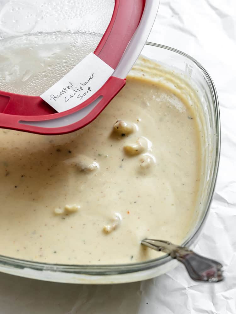 completed Roasted Cauliflower Soup in a storage container