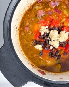 process shot showing adding ingredients to pot