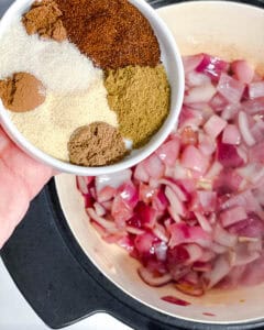 process shot showing spices being added to pot