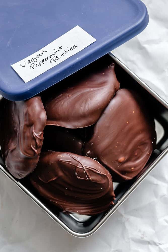 completed Vegan Peppermint Patties in a storage container