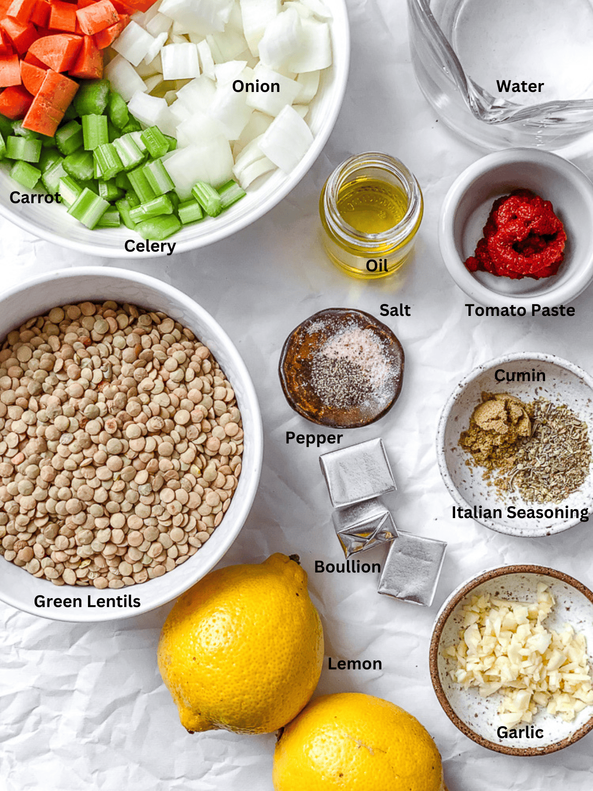 ingredients for Lemon Lentil Soup measured out on a white surface