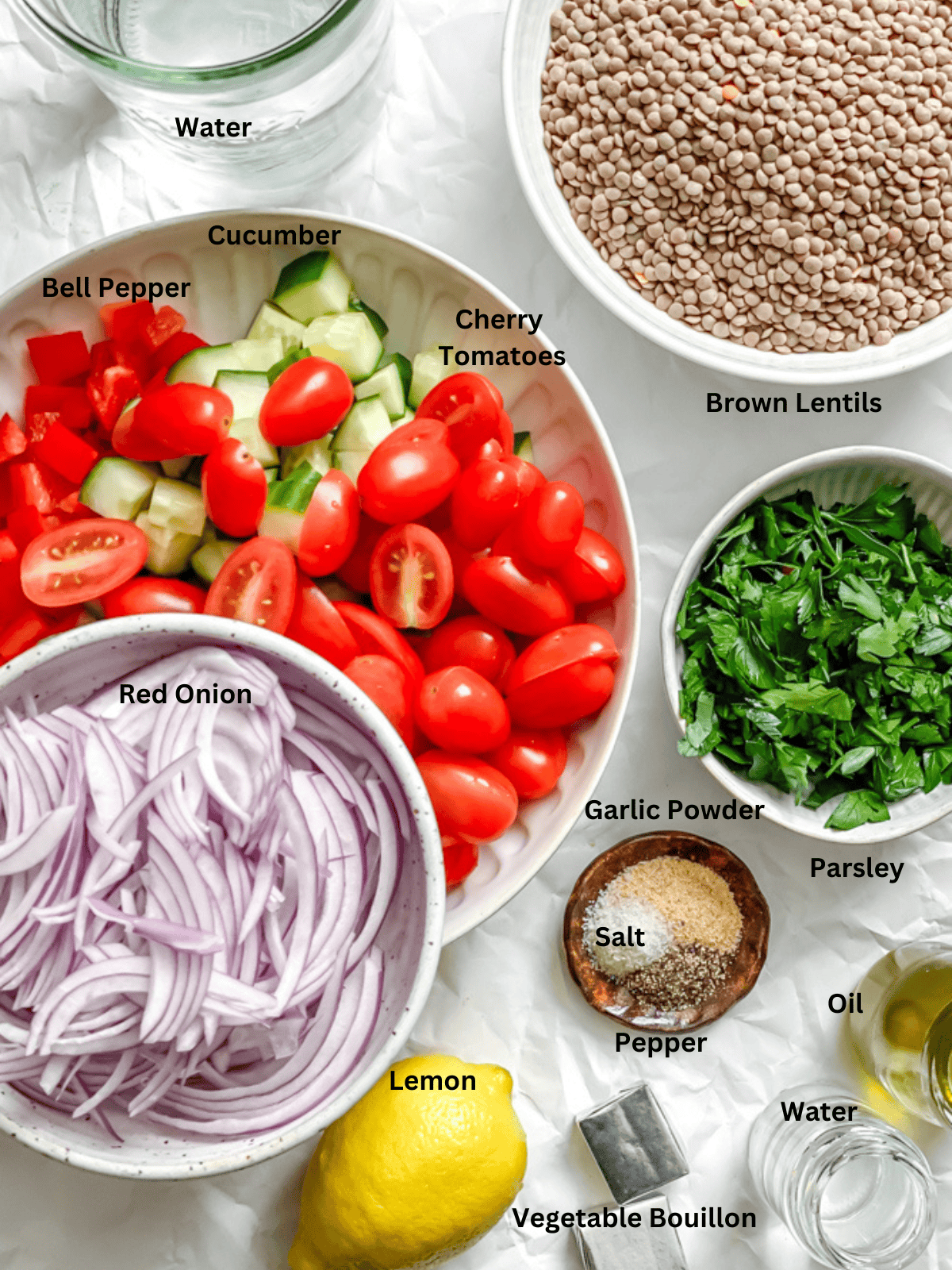 ingredients for Easy Lentil Salad measured out on a white surface