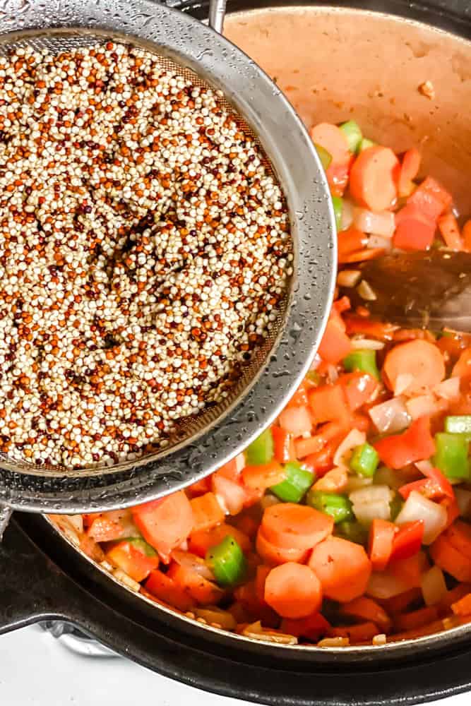 process shot of adding quinoa to pot