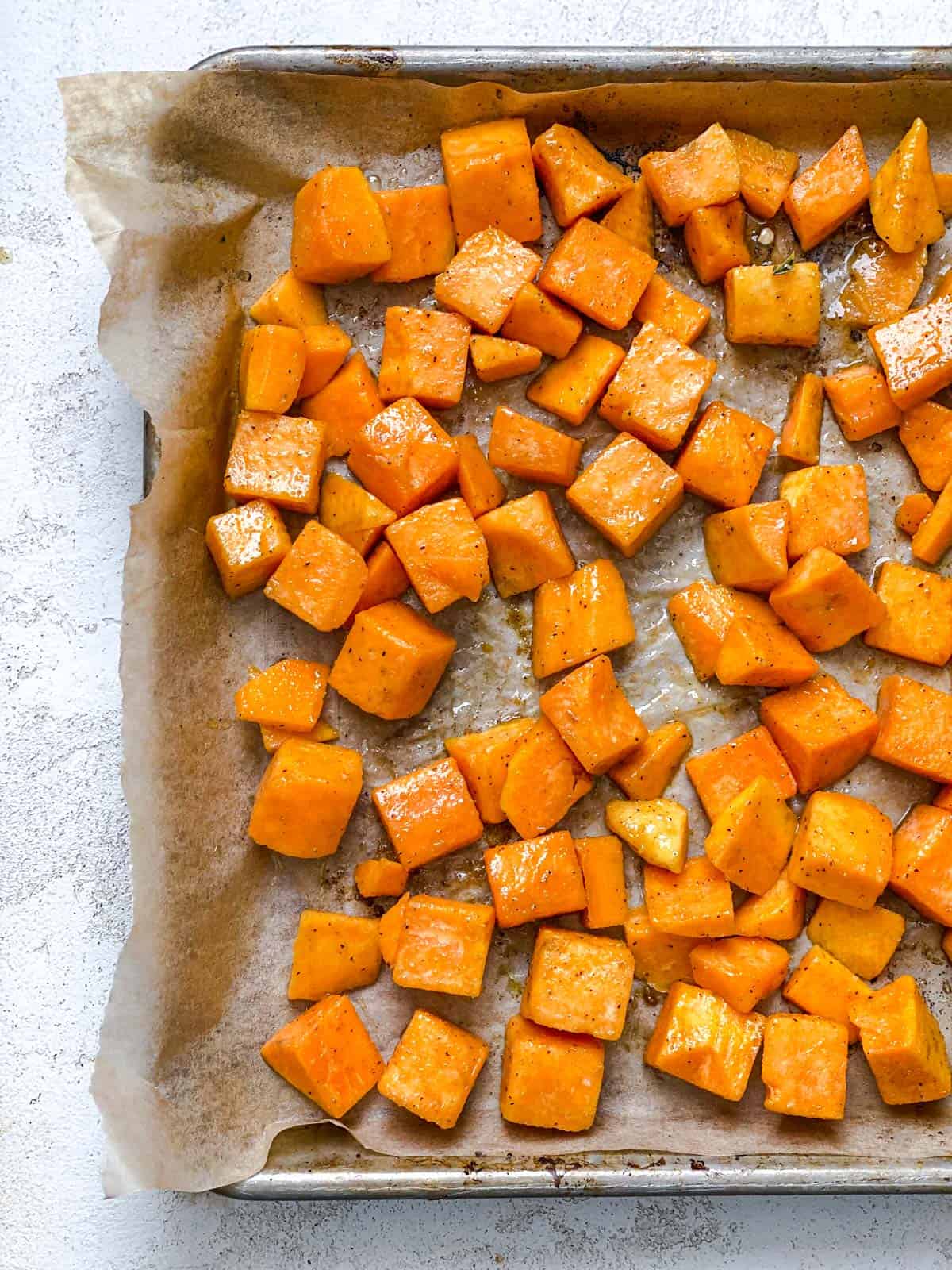 process shot showing post rosted butternut squash on baking tray