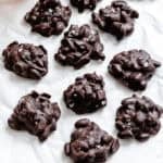 Completed Peanut Clusters on a white surface.
