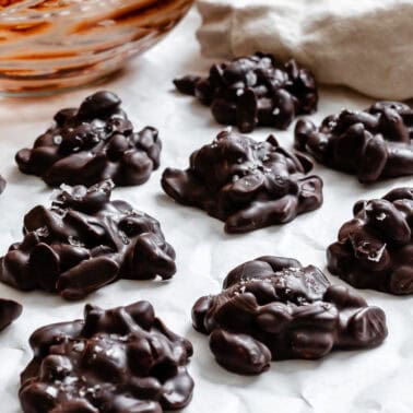 Completed Peanut Clusters on a white surface.