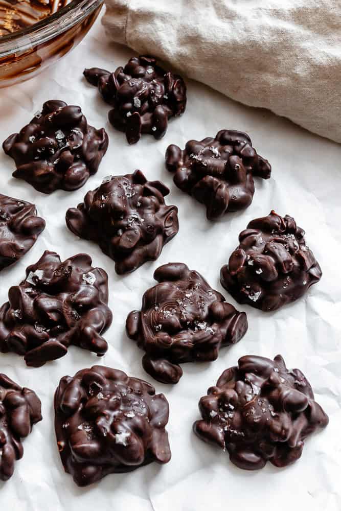 Completed Peanut Clusters on a white surface.