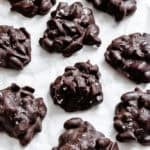 Completed Peanut Clusters on a white surface.