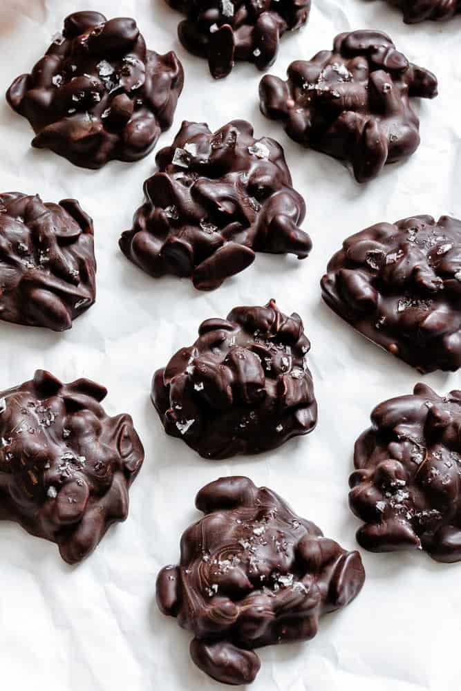 Completed Peanut Clusters on a white surface.