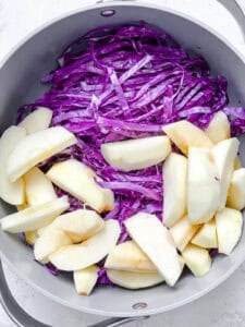 process shot showing adding apples to pan