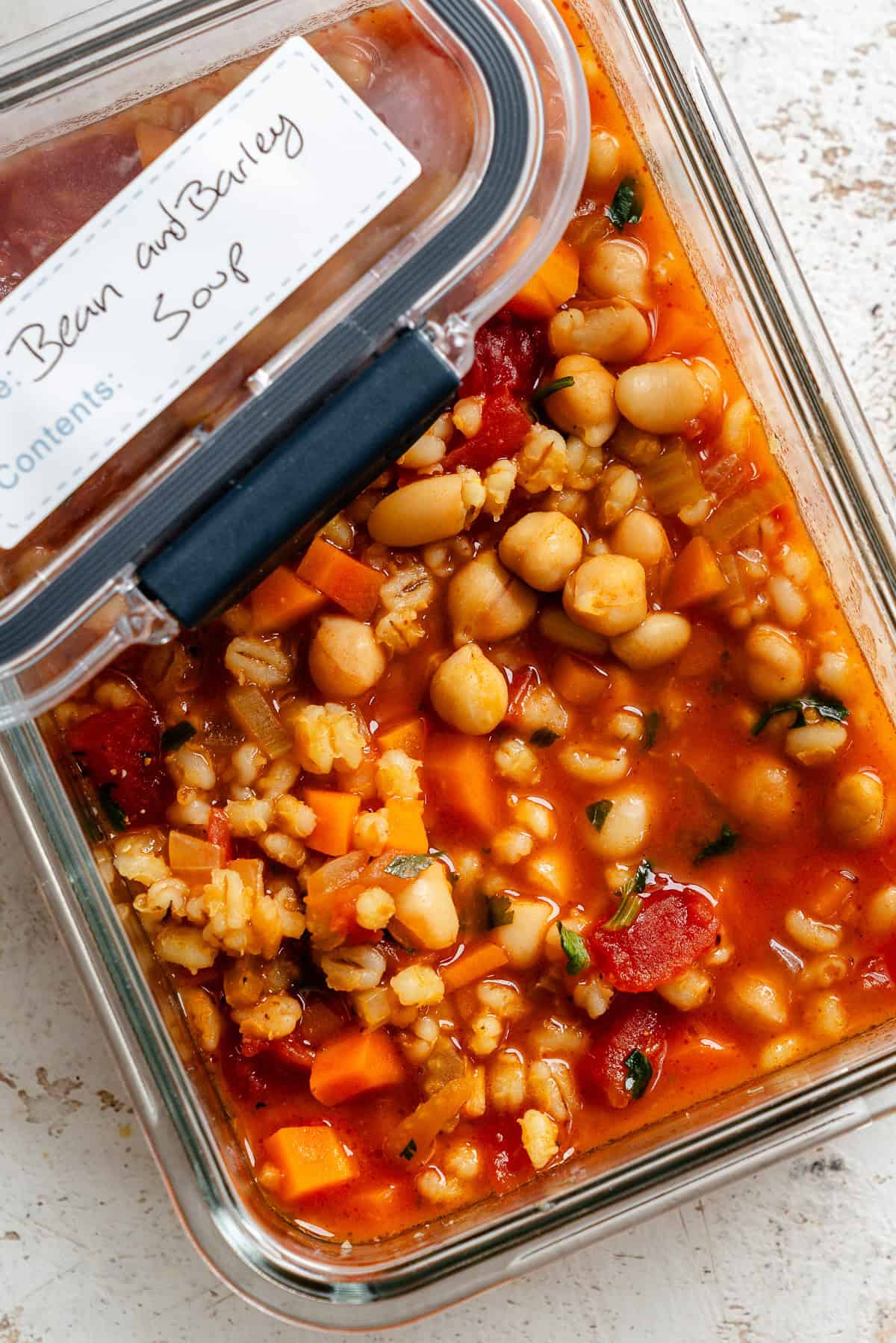 Completed Barley and Bean Soup in a storage container.