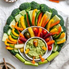 Completed Easy Turkey Veggie Tray on white surface.
