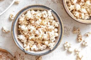Completed Chai Popcorn in a bowl against a white surface.