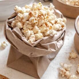 Completed Chai Popcorn in a bowl against a white surface.