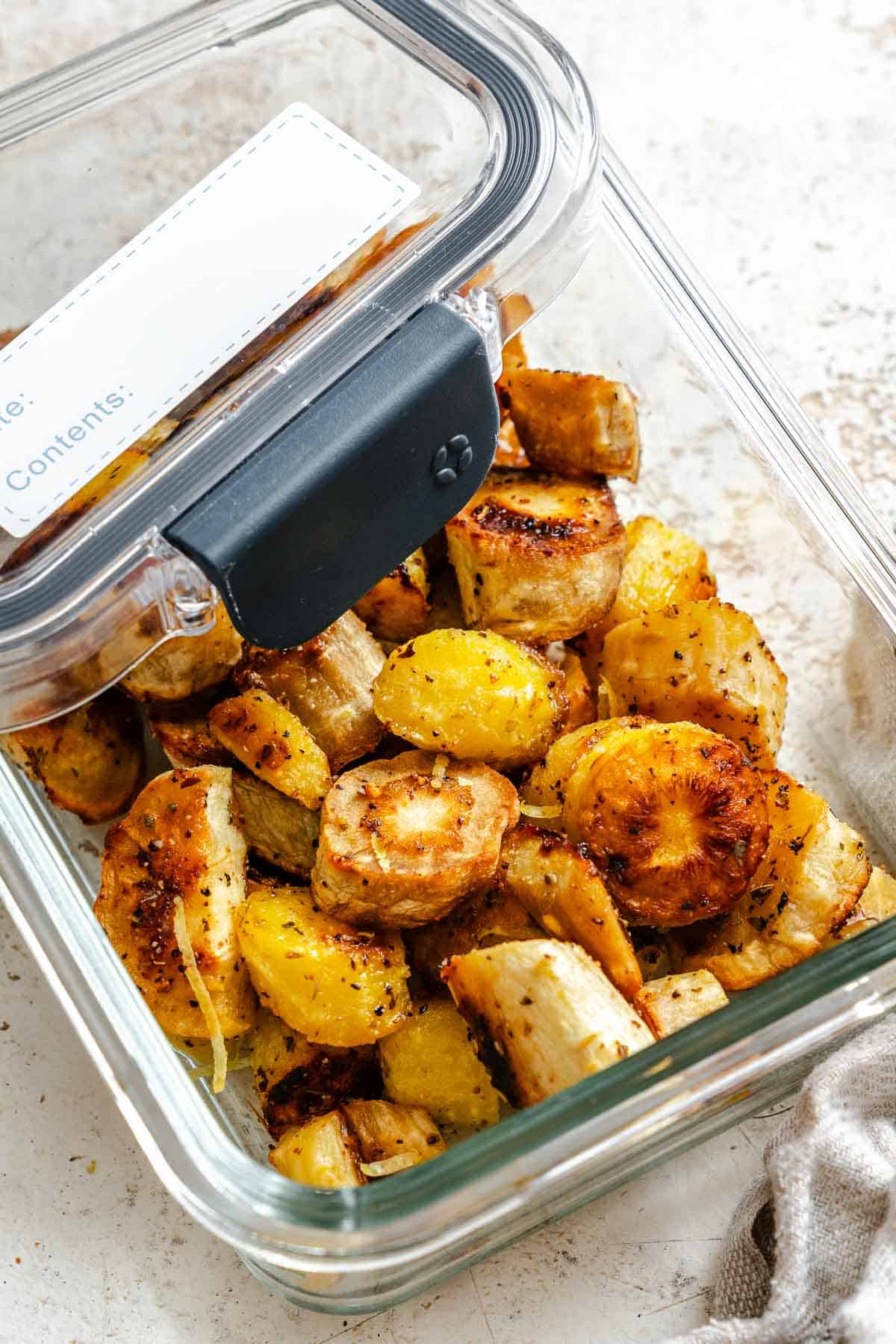 Completed Roasted Parsnips in storage container.