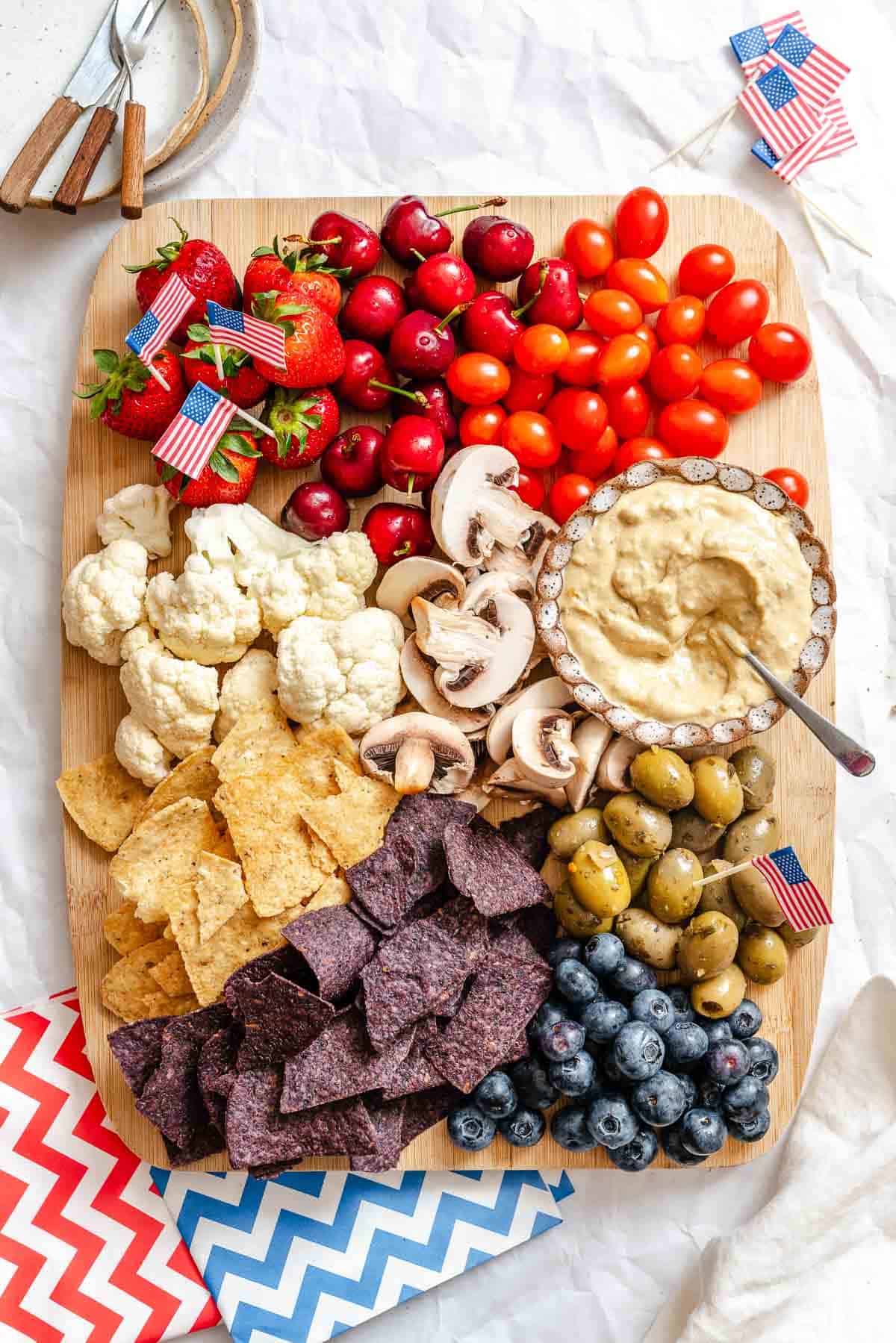 Completed 4th of July Charcuterie Board on a serving platter.
