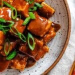 Completed Crispy Tofu with Peanut Sauce on a plate.