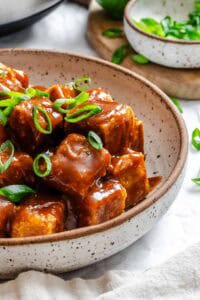 Completed Crispy Tofu with Peanut Sauce on a plate.