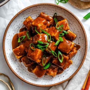 Completed Crispy Tofu with Peanut Sauce on a plate.