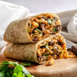 Two completed Rice and Black Bean Burrito (Freezer Friendly) stacked on one another.
