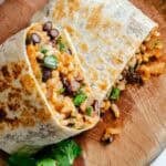 Two completed Rice and Black Bean Burrito (Freezer Friendly) stacked on one another.