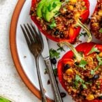 Completed Quinoa Stuffed Bell Peppers on a plate.