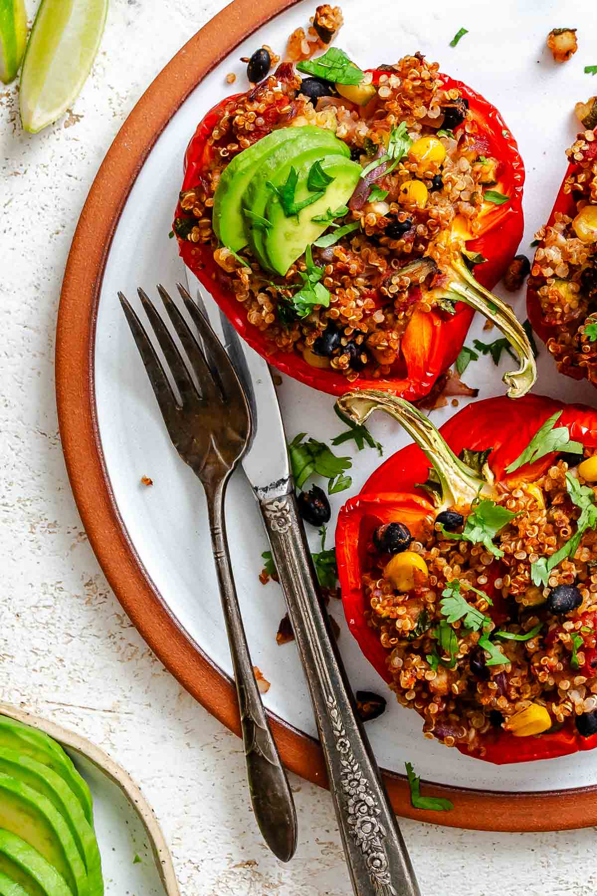 Completed Quinoa Stuffed Bell Peppers on a plate.