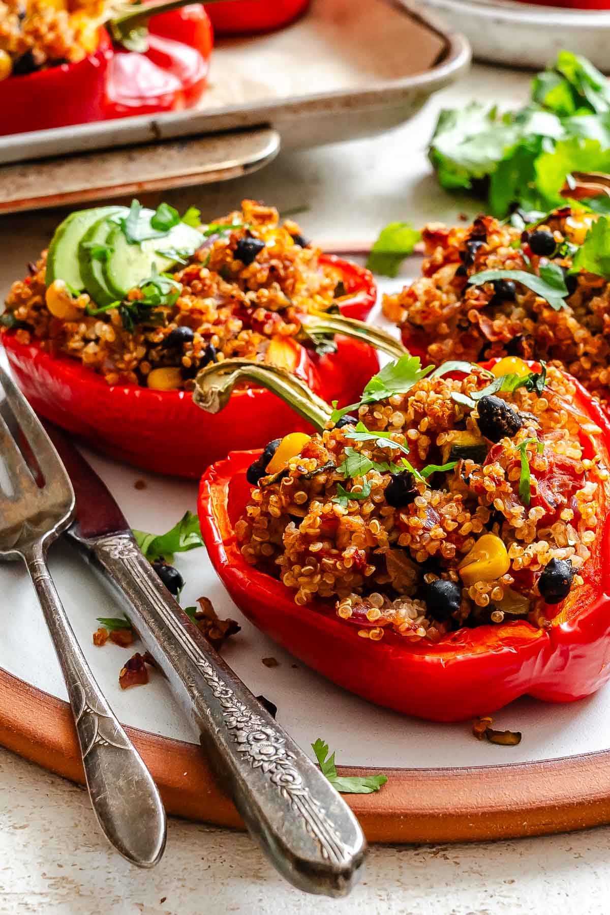 Completed Quinoa Stuffed Bell Peppers on a plate.