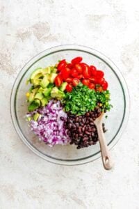 Process shot showing ingredients mixed in a bowl.